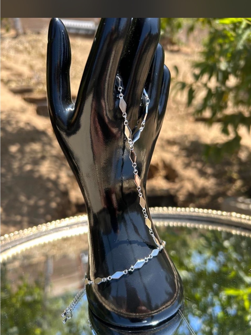 Silver tone hand chain